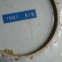 damage on bottom of plate